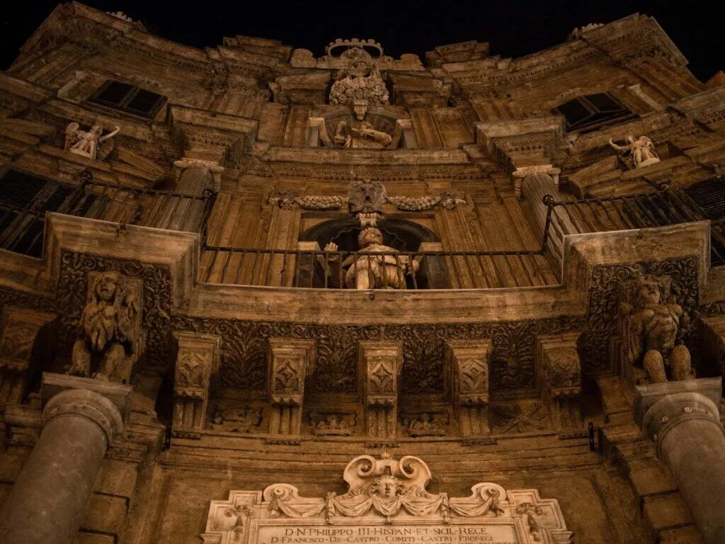 The baroque facade at Quattro Canti lit at night
