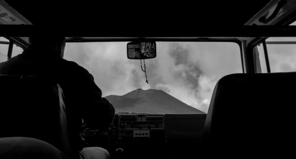 Etna framed through the windscreen of the summit shuttle jeep
