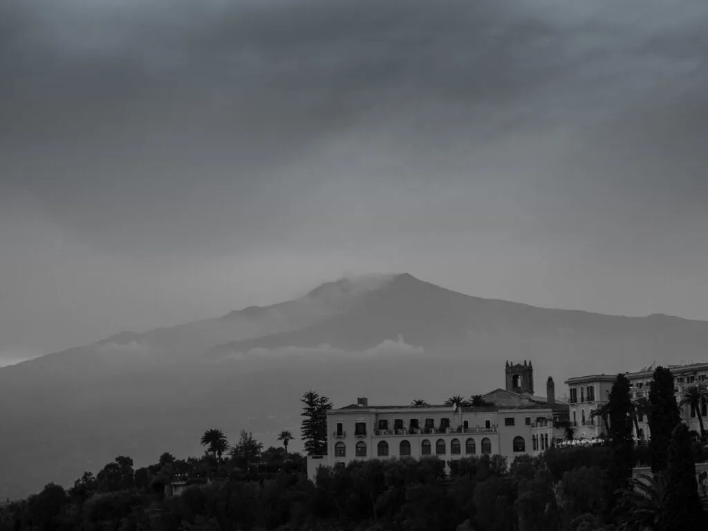 Etna smoking on the horizon behind San Domenico Palace