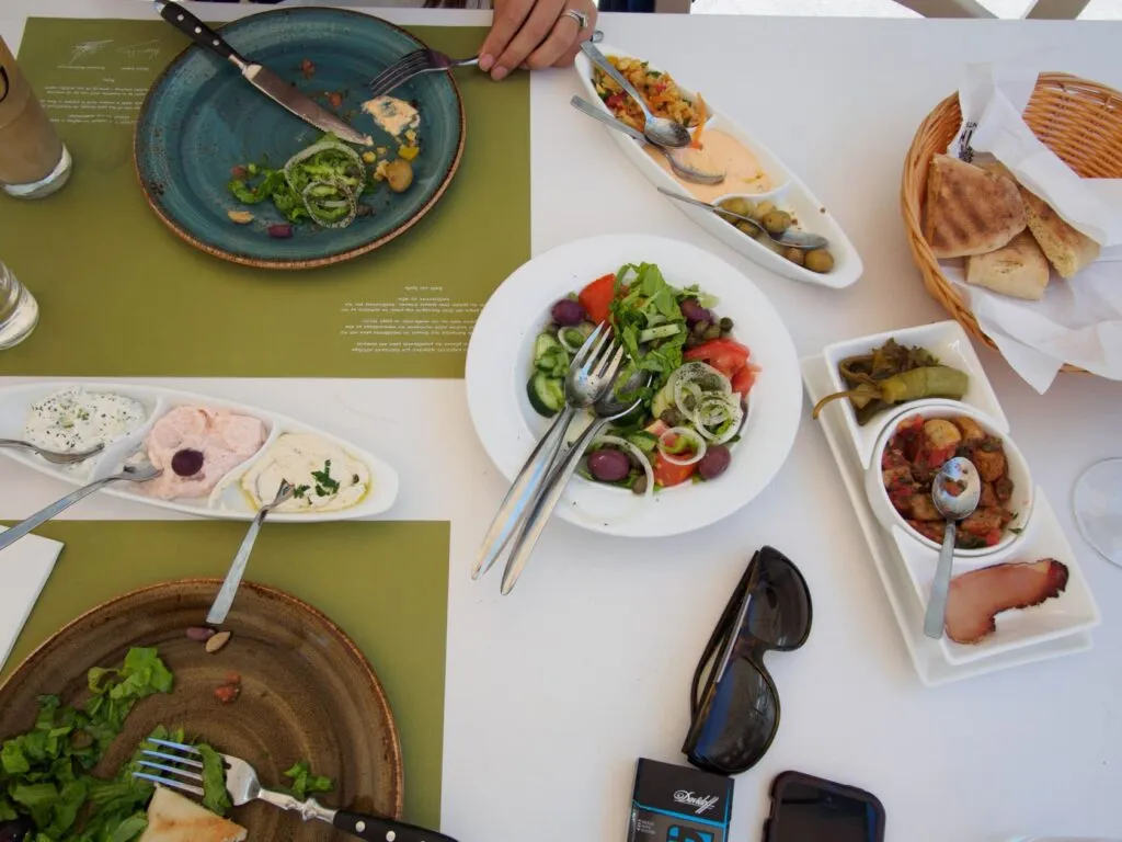 The table disappearing under meze plates