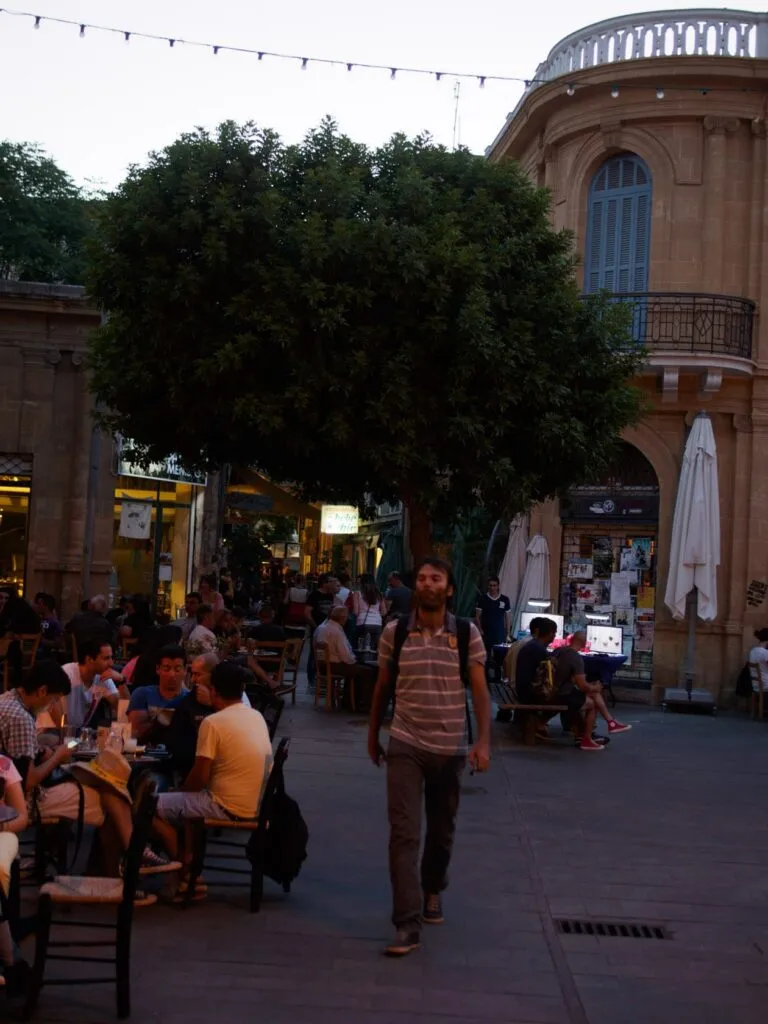 Cafe tables under the big tree on Ledra Street