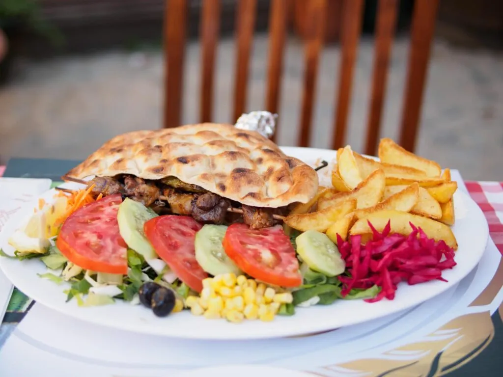 Kebab in flatbread with chips on the Turkish side