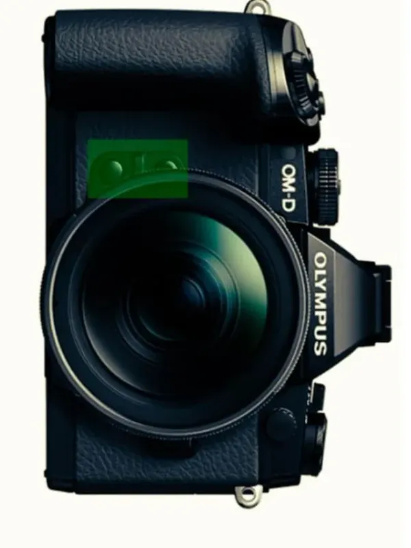 An Olympus E-M1 seen head on against white, the lens mounted and the OM-D name on the body.