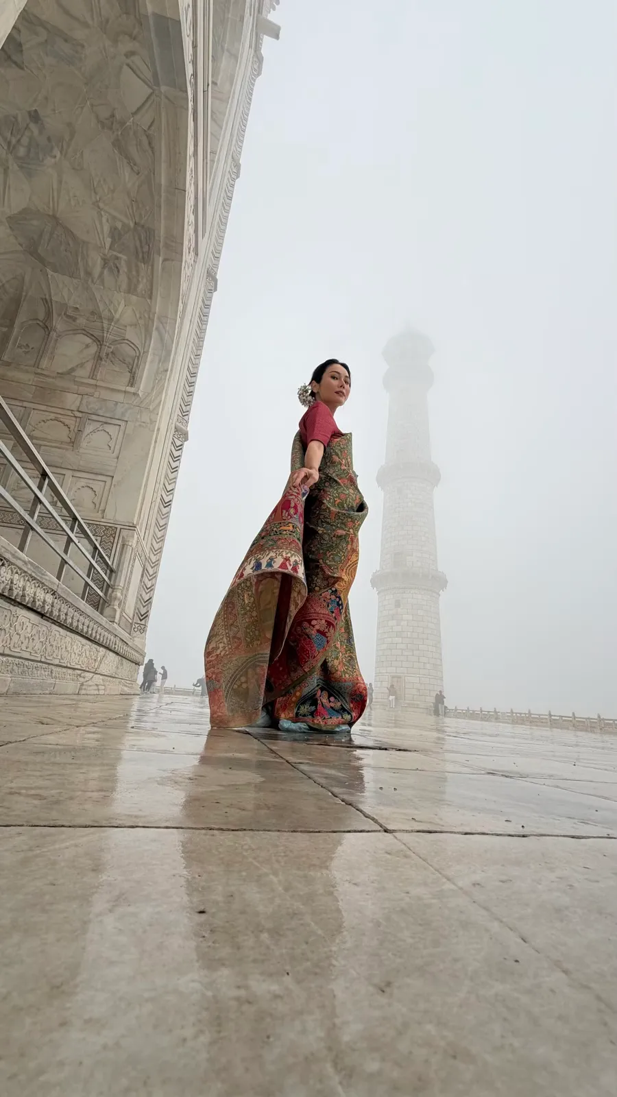 Woman in sari at Taj Mahal
