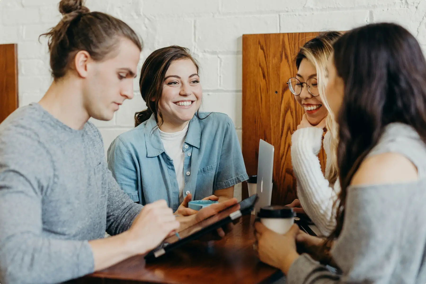A founding team at work in a bright startup office