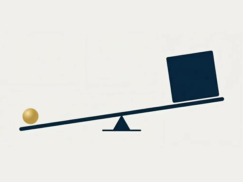 A lever tipped by a small gold ball on one end lifting a large navy block on the other