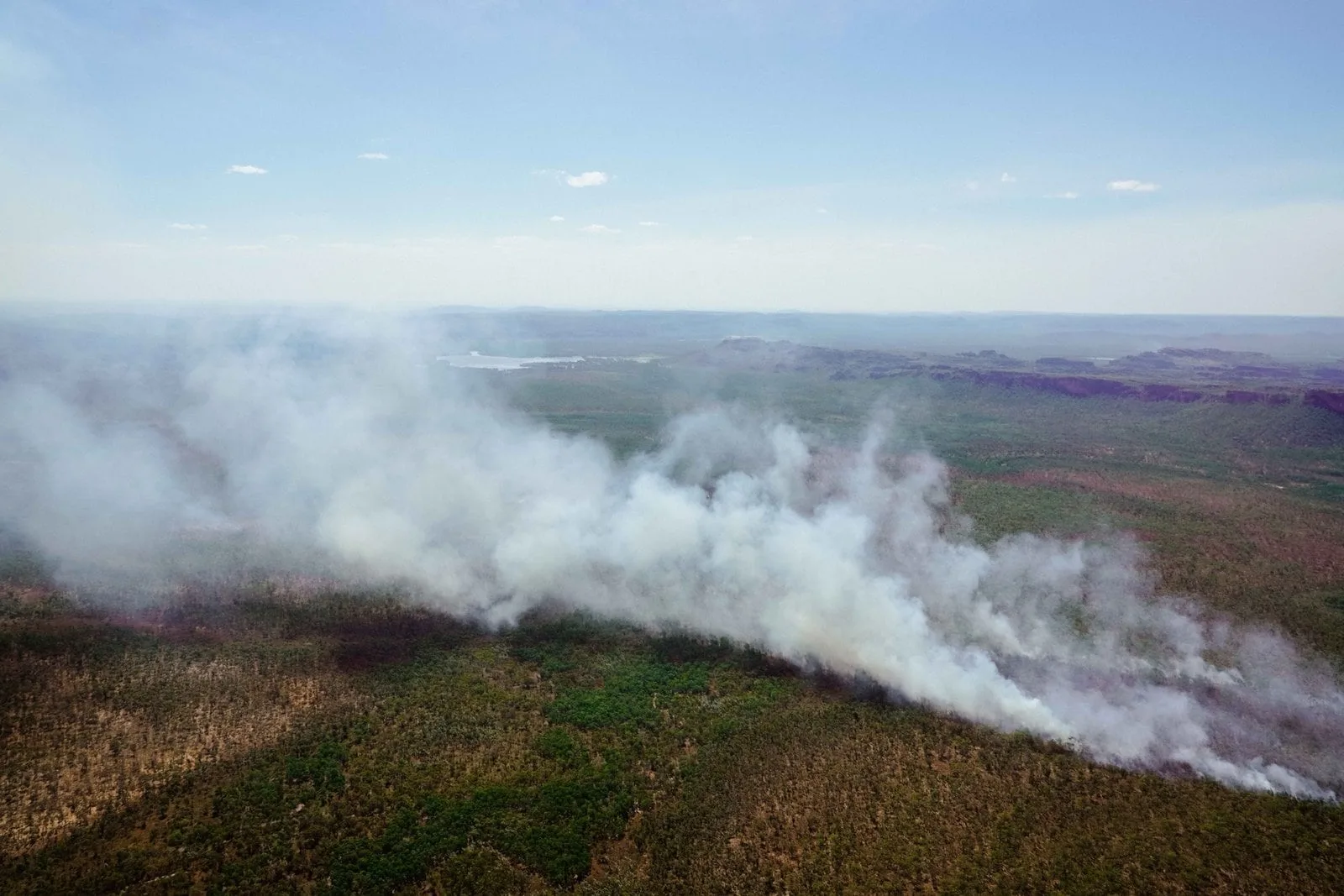 Smoke from a dry-season burn drifting across Kakadu National Park.