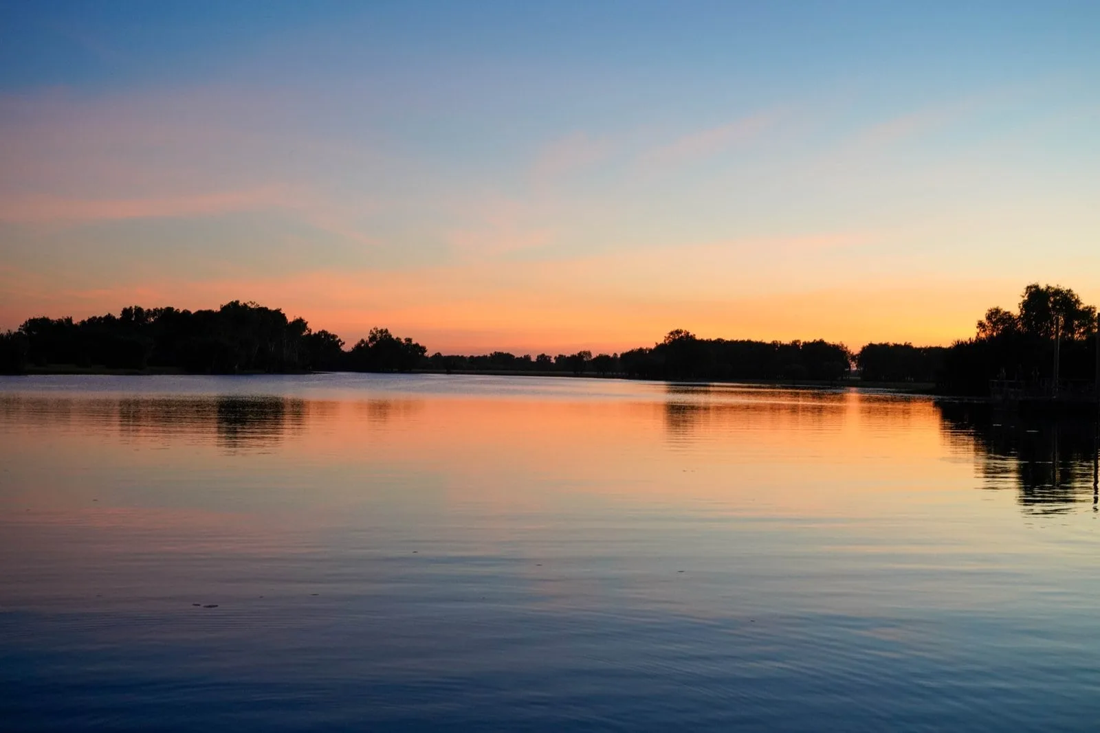 Pastel evening light reflected across Yellow Water in Kakadu.