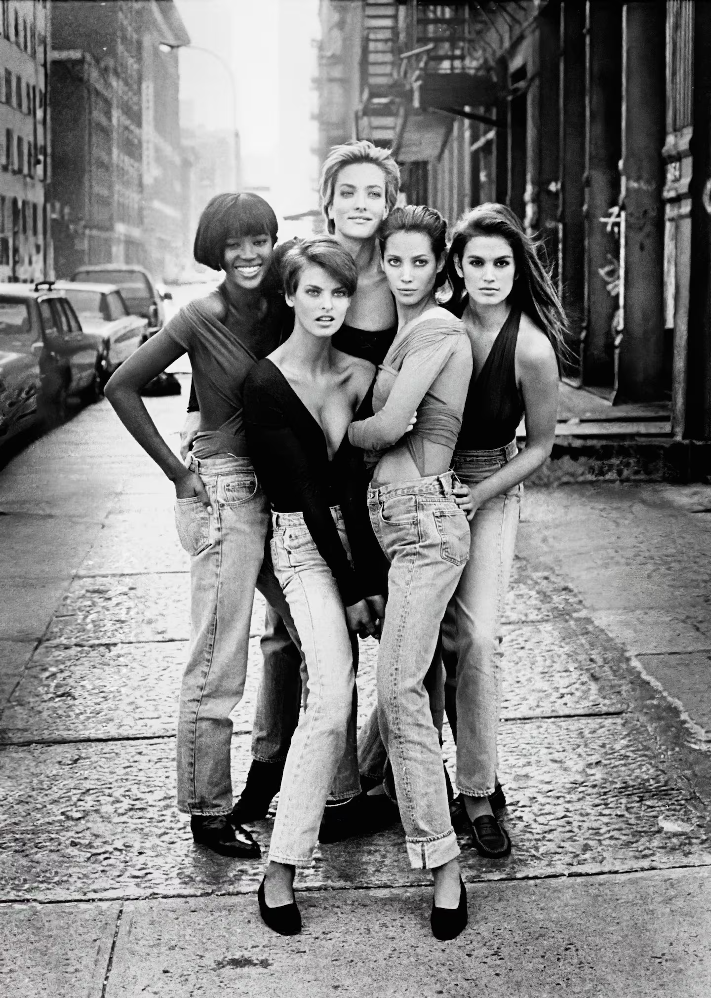 Supplied black-and-white group photograph, used as a visual pun on multiple models