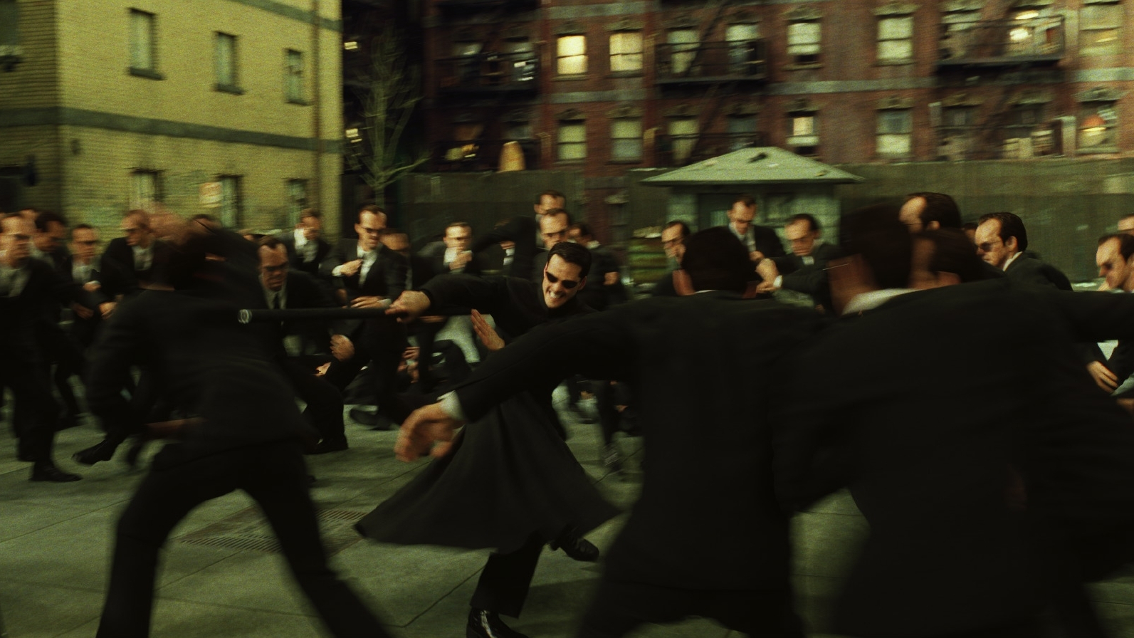 Neo surrounded by Agent Smith copies in The Matrix Reloaded